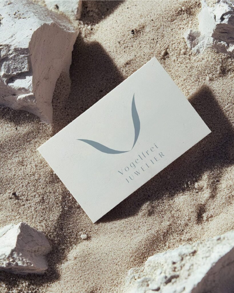 business card jeweler in the sand